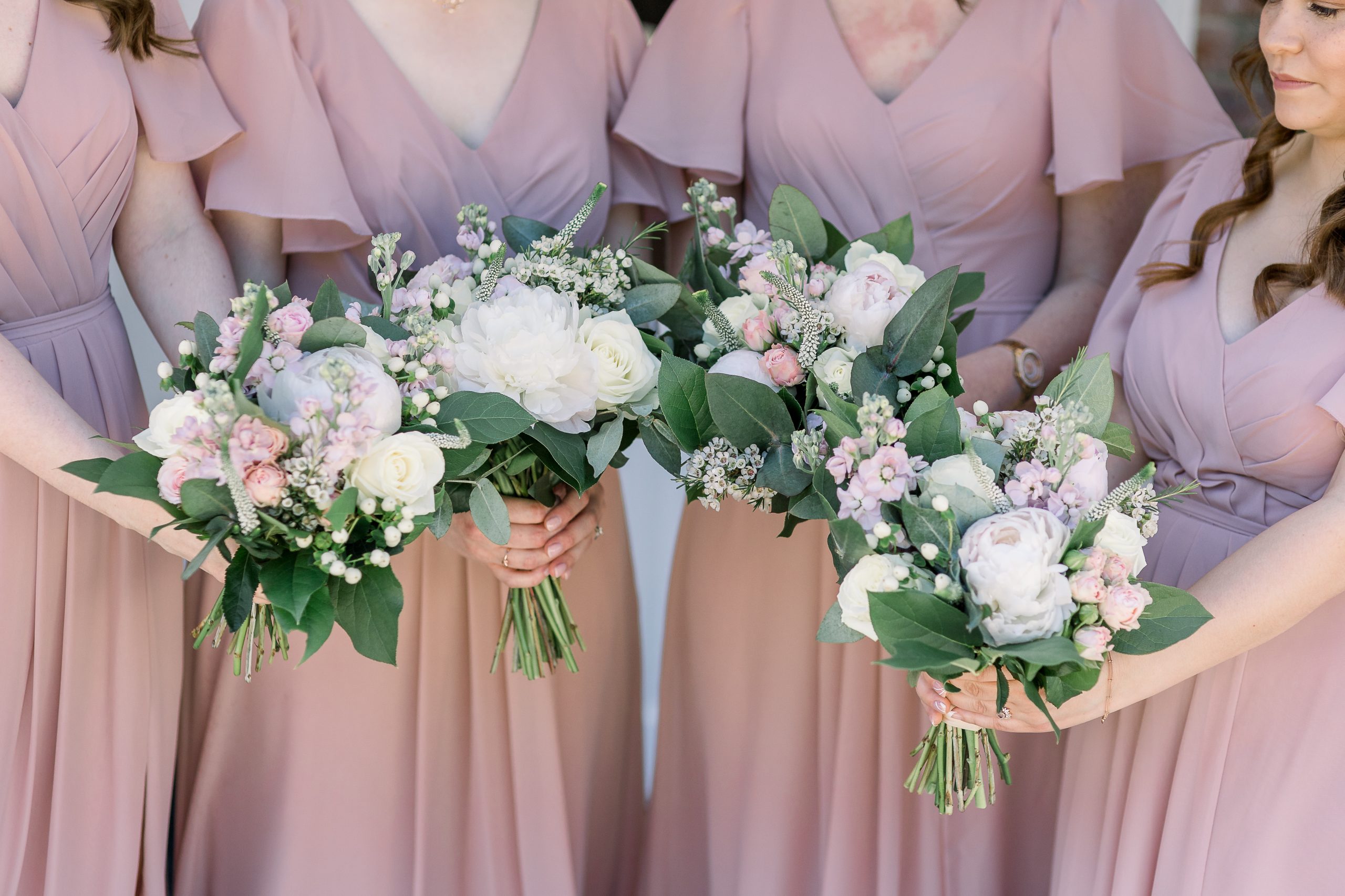 Spring flowers on Hayley and Ollie's wedding day, featuring Hyacinth, Ranunculus, Veronica and Lily of The Valley.